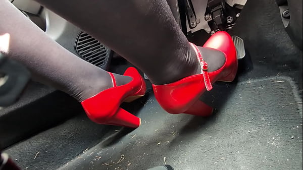 Image Pedal Pumping in Heels on way to Office