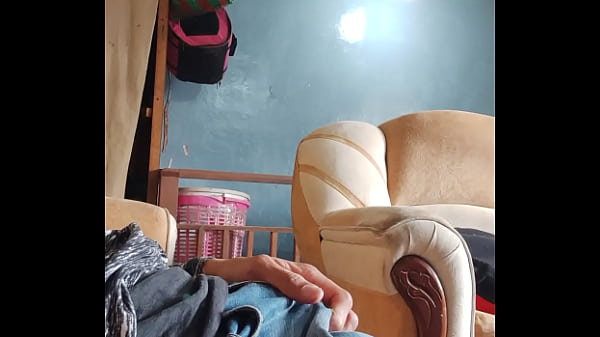 Image MASTURBATING MY COCK IN THE LIVING ROOM.