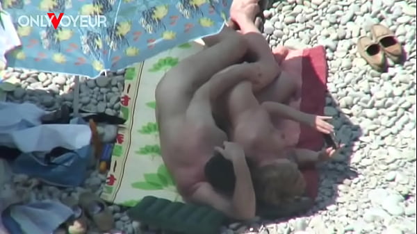 Image Beach Voyeur. Mature couple fucking under the shining sun