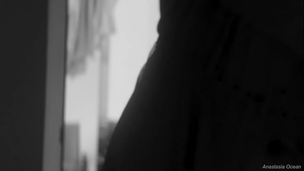 Image Naked chubby woman hangs out laundry on the balcony for neighbors can watch