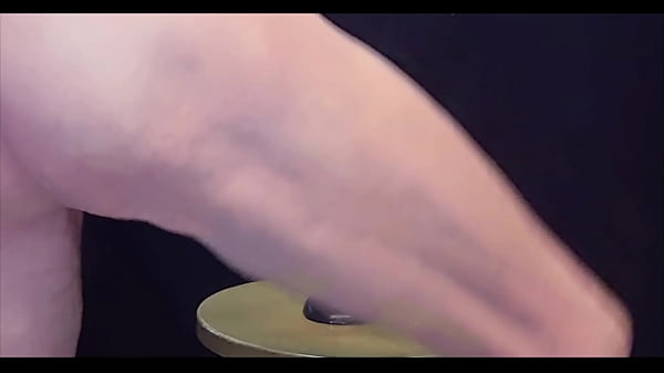 Image Busy Bottom close up on a black dildo