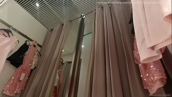 Image Amazing girl with big boobs changing clothes in fitting room