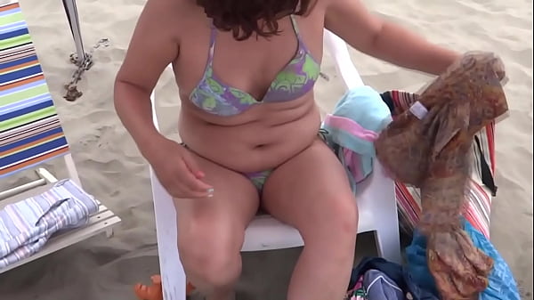 Image On the beach, several cumshots that my stepson gave me with his big cock, he wants anal sex