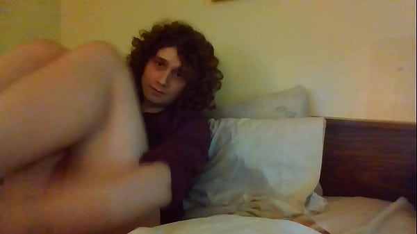 Image Curly hair femboy plays with big thick dick