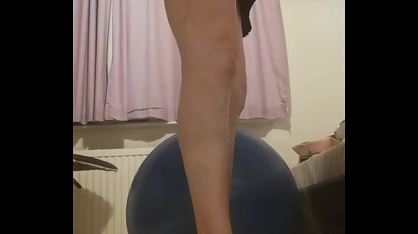 Image Dildo riding with cock cage