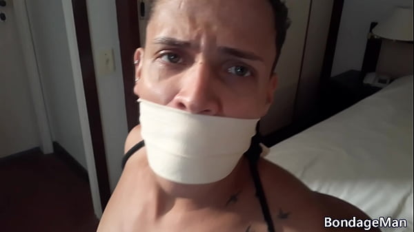 Image Henrique in bondage tied up gagged and caged in motel room | free