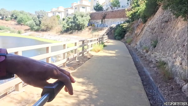 Image Hot Guy walking and masturbating his cock in public places