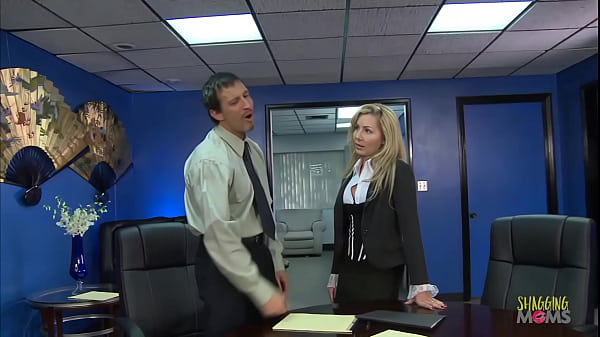 Image Beautiful blonde milf with big tits lets her boss fuck her in the office