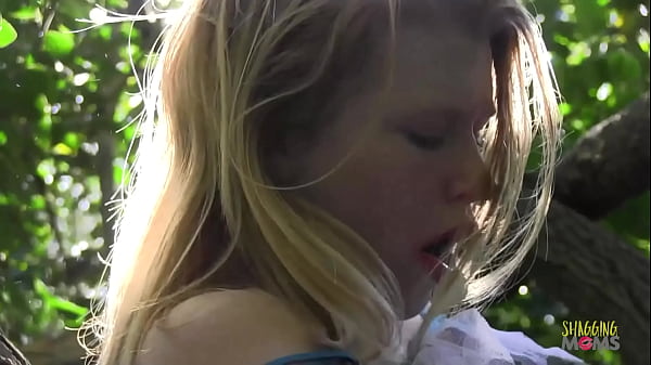 Image Blonde climbs up the tree for her solo masturbation session