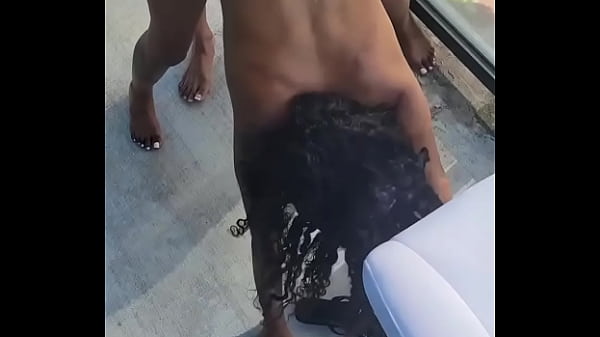 Image Kashofficials getting strapped by Renity Love on the balcony