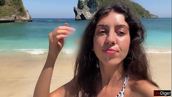 Image Hottie sucks my dick on a public beach and walks along the shore with cum on her face - Cumwalk