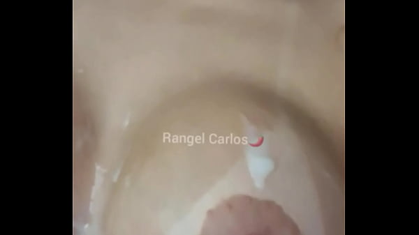 Image Lambendo tudinho que ele gozou nos meus peitos