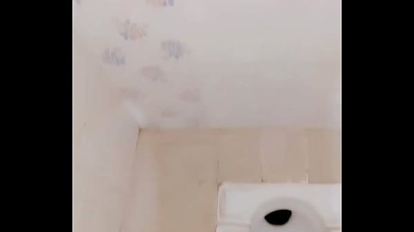 Image Crossdresser pissing and masturbating in toilet