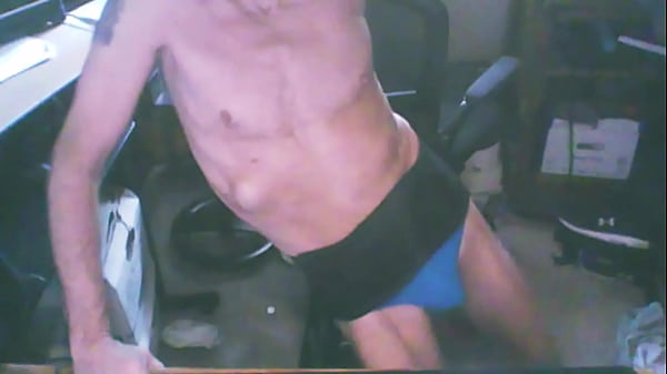 Image 2023 Grinding on Stool in Blue Briefs and Back Brace for Stretching and Pain Relief