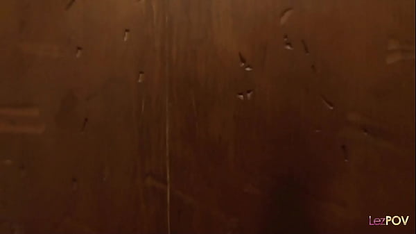 Image Night time bathroom fuck between two horny dykes and it involves plenty scissoring and fingering on the bed