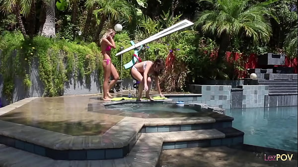 Image Two beautiful vixens are sitting by the pool and then go inside for an intense fuck