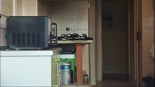 Image Hot guy went to clean the kitchen after taking a shower