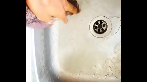 Image Washing my BBC in the kitchen sink before washing the plates. FULL CUM VIDEO IN RED. Who wants my Dick?