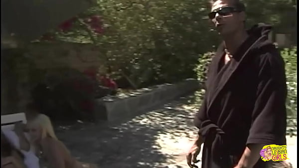 Image They film two hot blondes having lesbian sex with a sex toy near the pool