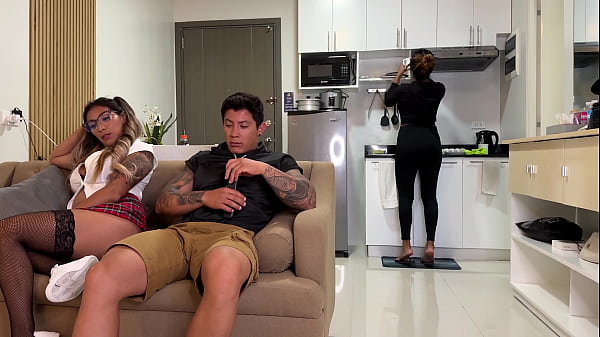 Image Naughty college girl fucks her mom's boyfriend on the couch and she doesn't notice