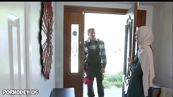 Image Handyman helps Hijab Girl Naudi Nala in Her First Doggystyle Sex