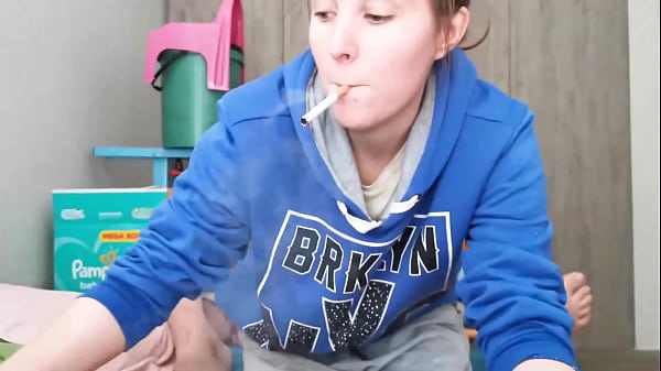 Image Brunette in Hoodie Sucking Cock
