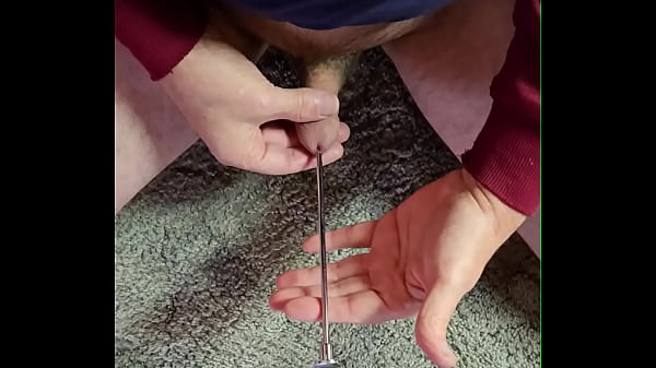 Image ToOldToMind Slides Steel Rod Down His Tiny Cock