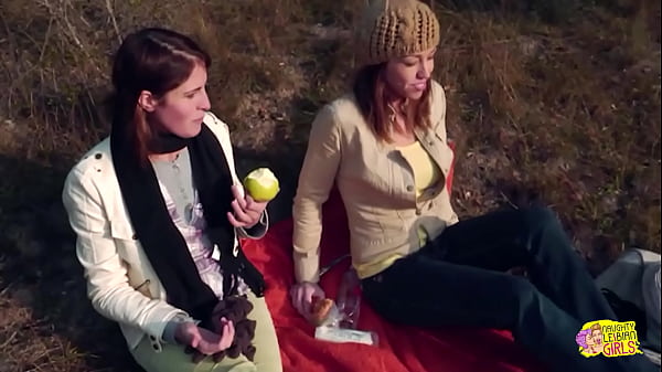 Image An outdoor picnic between two brunette friends quickly turns into lesbian sex with a strapon