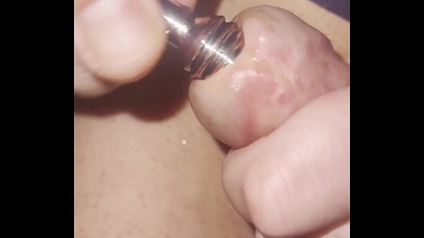 Image Playing with very big penis plug drill