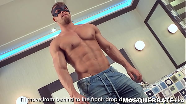 Image Masked muscular hunk masturbates his big long cock
