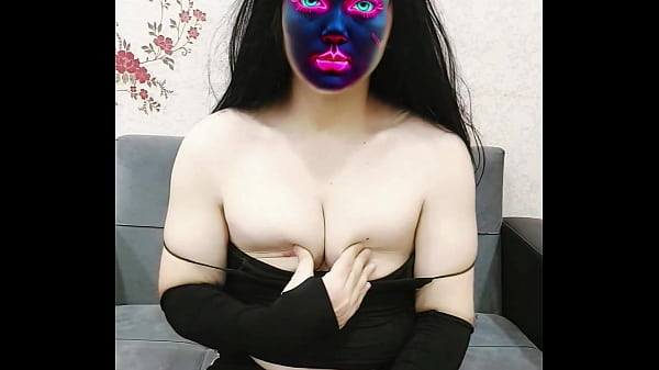 Image Masked and Mesmerizing: Sexy Dance in Black Outfit and Snow-White Skin