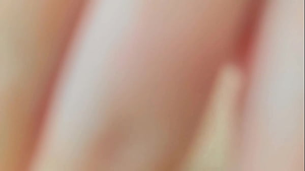 Image Sexy female student with yellow manicure arouses herself