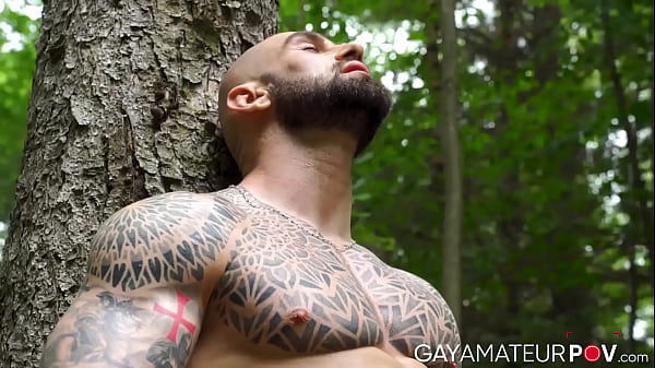 Image Buff tattooed Axel Reed shoots a hot load after jerking his big cock