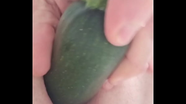 Image Close up dildo and zucchini