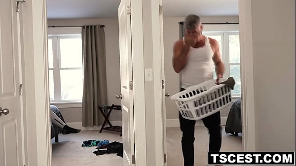 Image Stepdad Dillon Stone fucking his stepson Joey Michaels hard making him moan in delight just as they both do the laundry together
