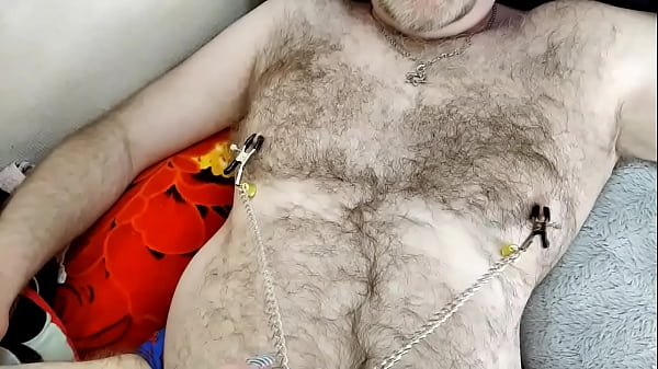 Image An adult girl & a dick-43. Mature bitch with a dick in her mouth, with nipple clamps and cum flowing out of her horny old cunt.