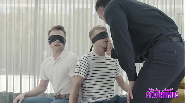 Image Mafia henchman Nik Fros examines the newly arrived goods, two twinks named Andrew Connor and Noah White, that had just been delivered to his penthouse!