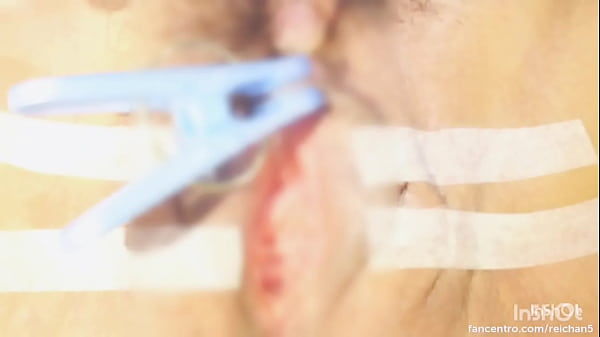 Image Sucking and pinching the clitoris.