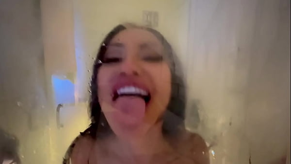 Image Asian girl with huge tits swallows my huge cock in the shower, and I fuck her tight wet pussy.