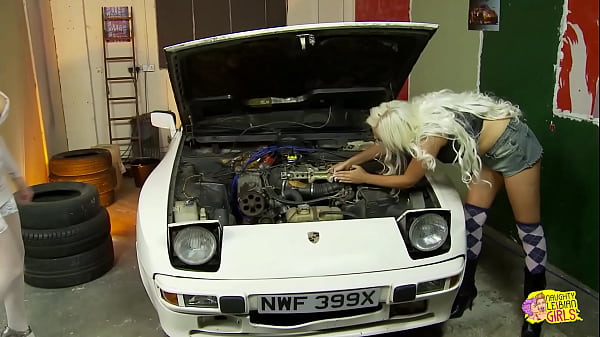 Image Before servicing the car the busty Paige Ashley and Dolly Delight satisfy their lesbian cravings