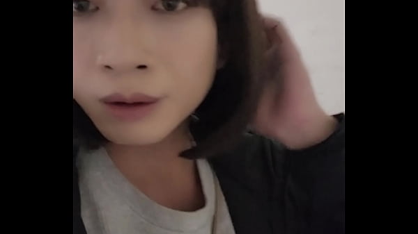 Image Shemale Ting Xuan outdoors peeing and takes off her underwear for masturbates in the park.