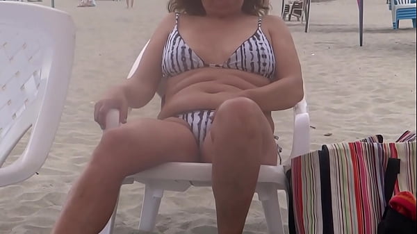 Image I cum in my stepmom's pussy, she puts on a bikini and goes out to the beach to show off