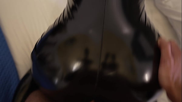Image He picks me up and fucks me from behind, and cums on my latex suit. I love doggystyle