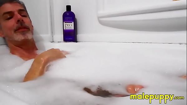 Image Giant old man Richard Leonox teases you with how he strokes his huge cock in the tub