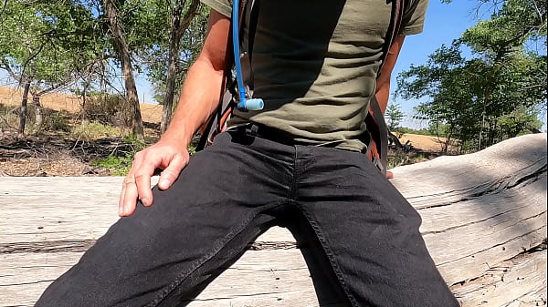 Image Wetting the new black jeans in public