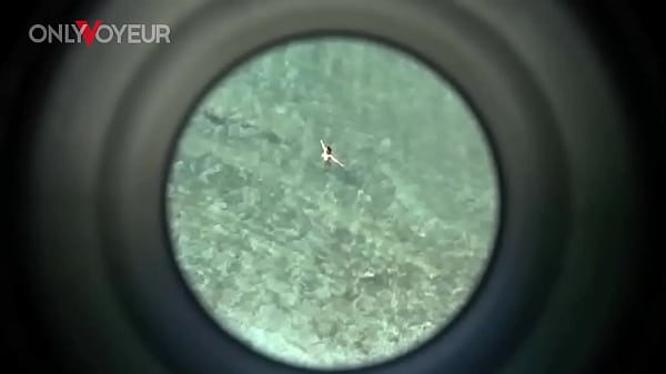 Image Beach Voyeur. Busty cougar riding hard dick and getting load of cum on her face