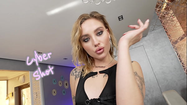 Image Tattooed slut Cyber Shot drinks piss and cum on a thick cock!