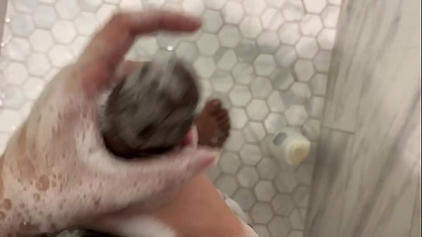 Image Stepsister joins stepbrother in shower and gives him a hand