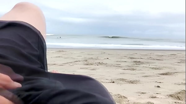 Image A fat dick in the ass perked up a milf dozing on the beach!