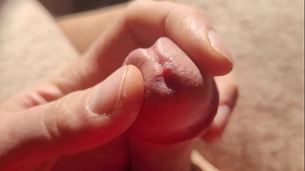 Image Edging from flaccid and playing with precum, natural light